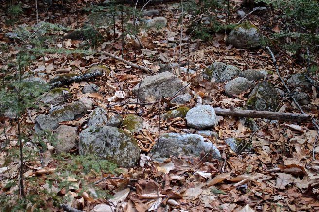 h-stone pile beside willard