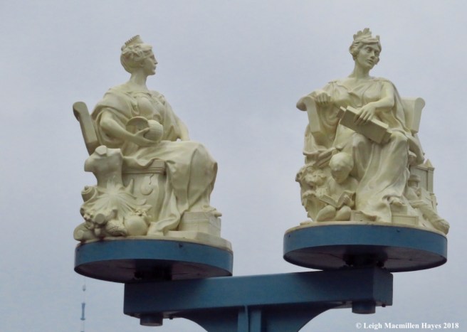 40-rotating statues of Miss Brooklyn and Miss Manhattan